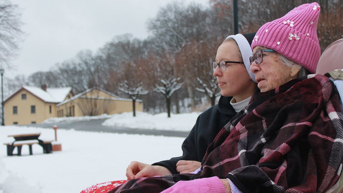 sister-sits-with-resident
