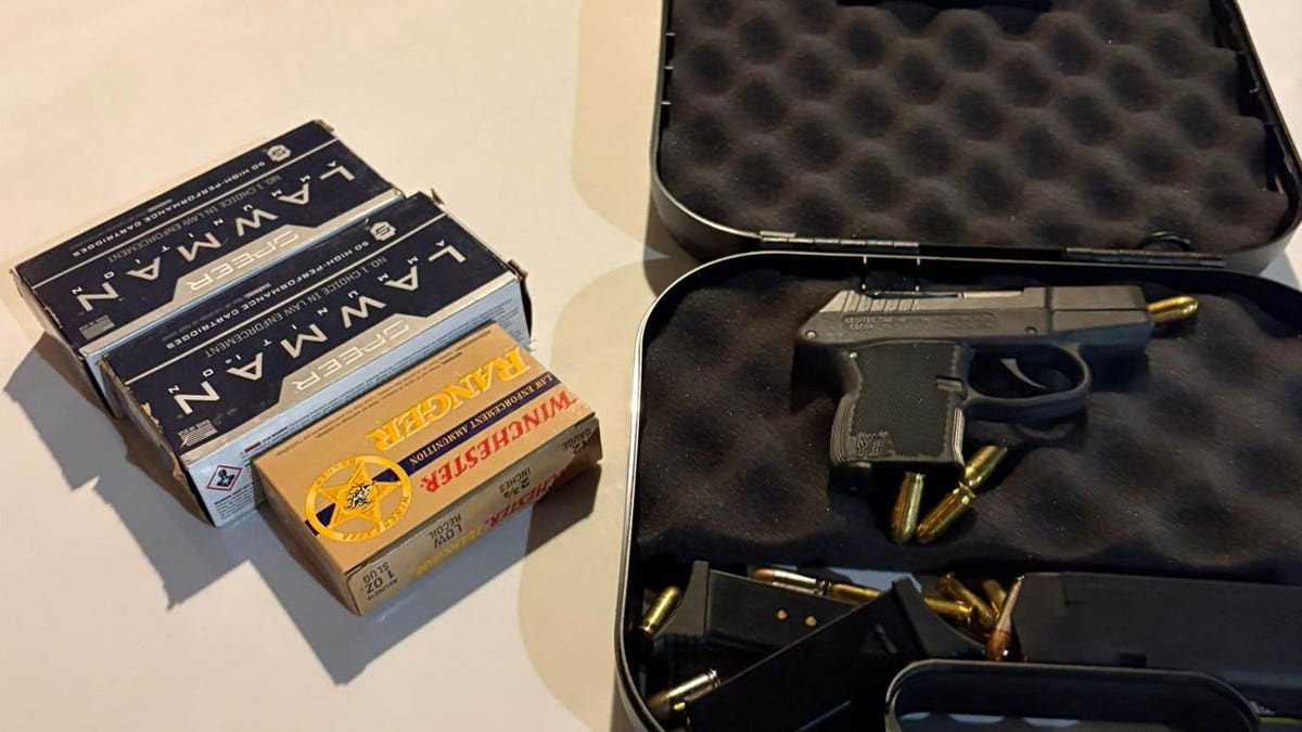 A handgun and ammunition recovered from a Florida edifice  room