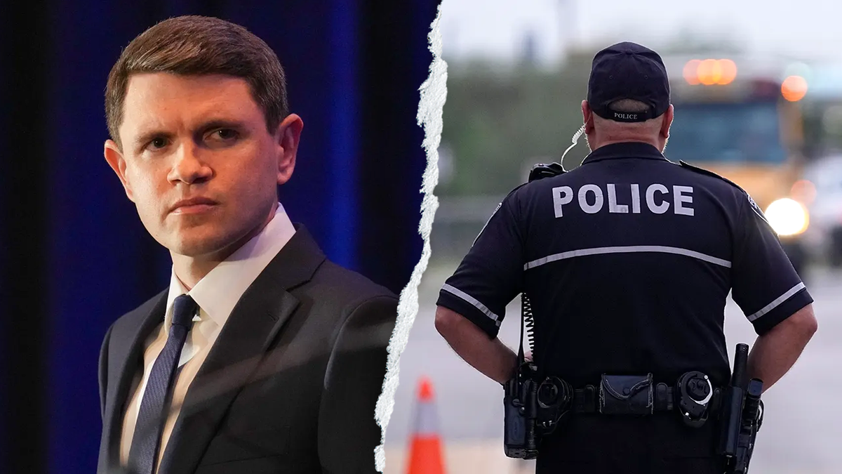 James Talarico aside from a police officer at a school in Texas