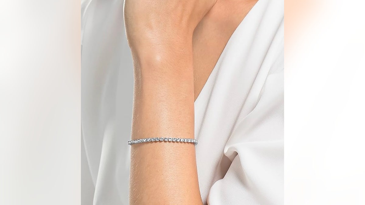 Adorned in crystals, this bracelet makes a statement. 