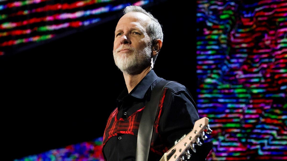 Tom Dumont of No Doubt performing onstage at The Kia Forum in Inglewood, California