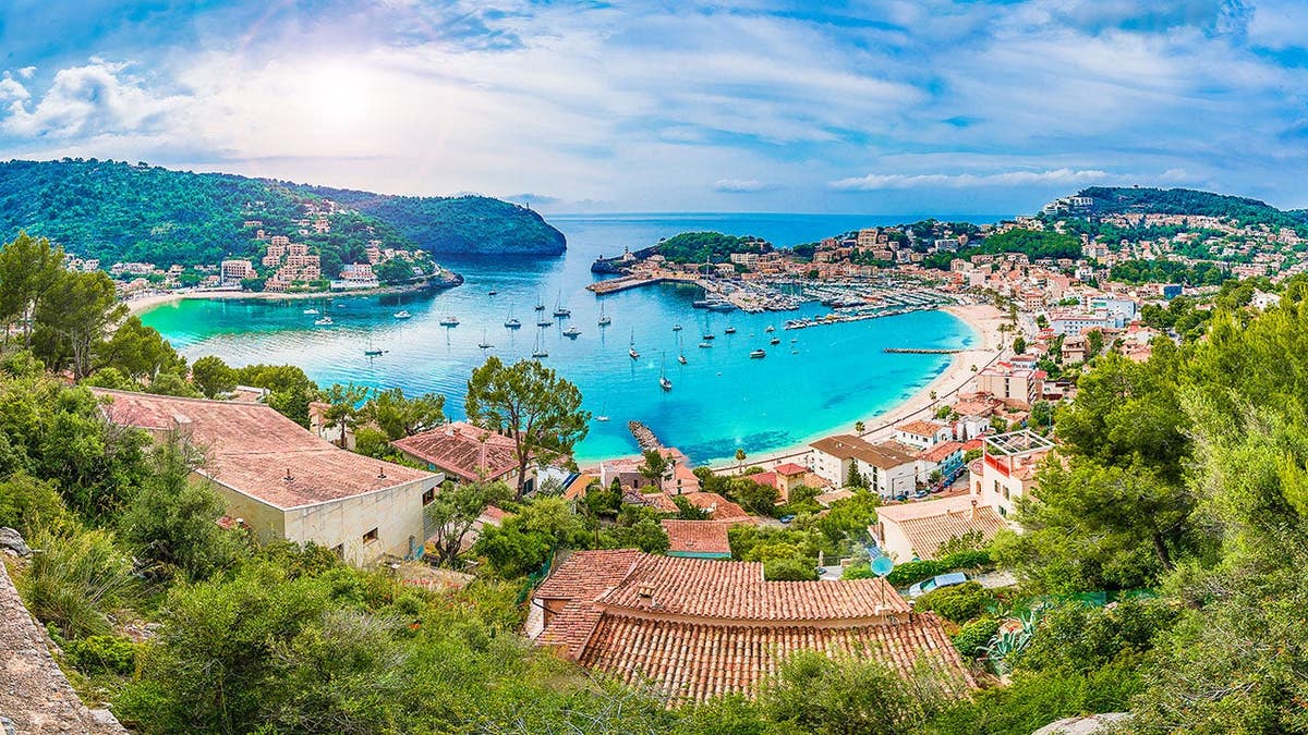 Majorca, Menorca and Ibiza want to cap visitor numbers as overtourism surges 1 Panoramic view of Porte de Soller in Spain