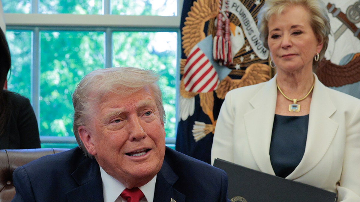 President Donald Trump and Education Secretary Linda McMahon