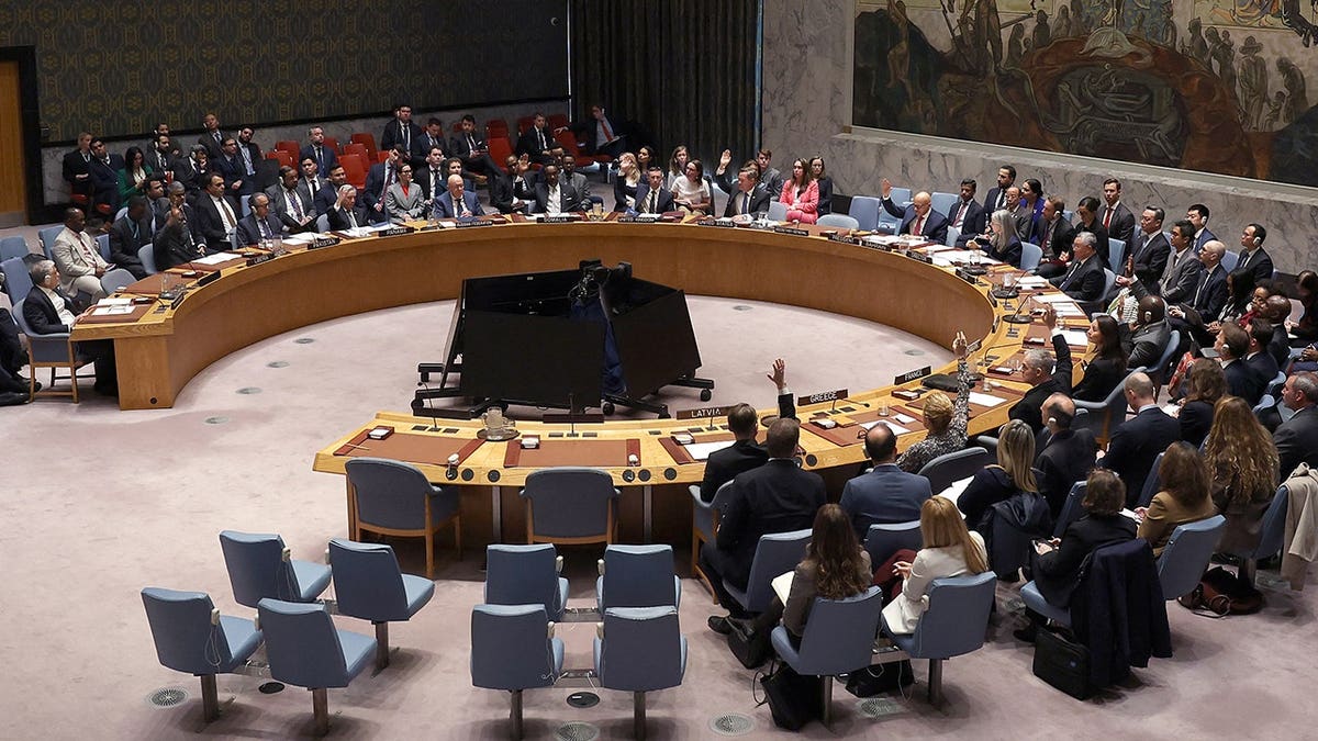 Members of the United Nations Security Council voting during a meeting at UN headquarters in New York