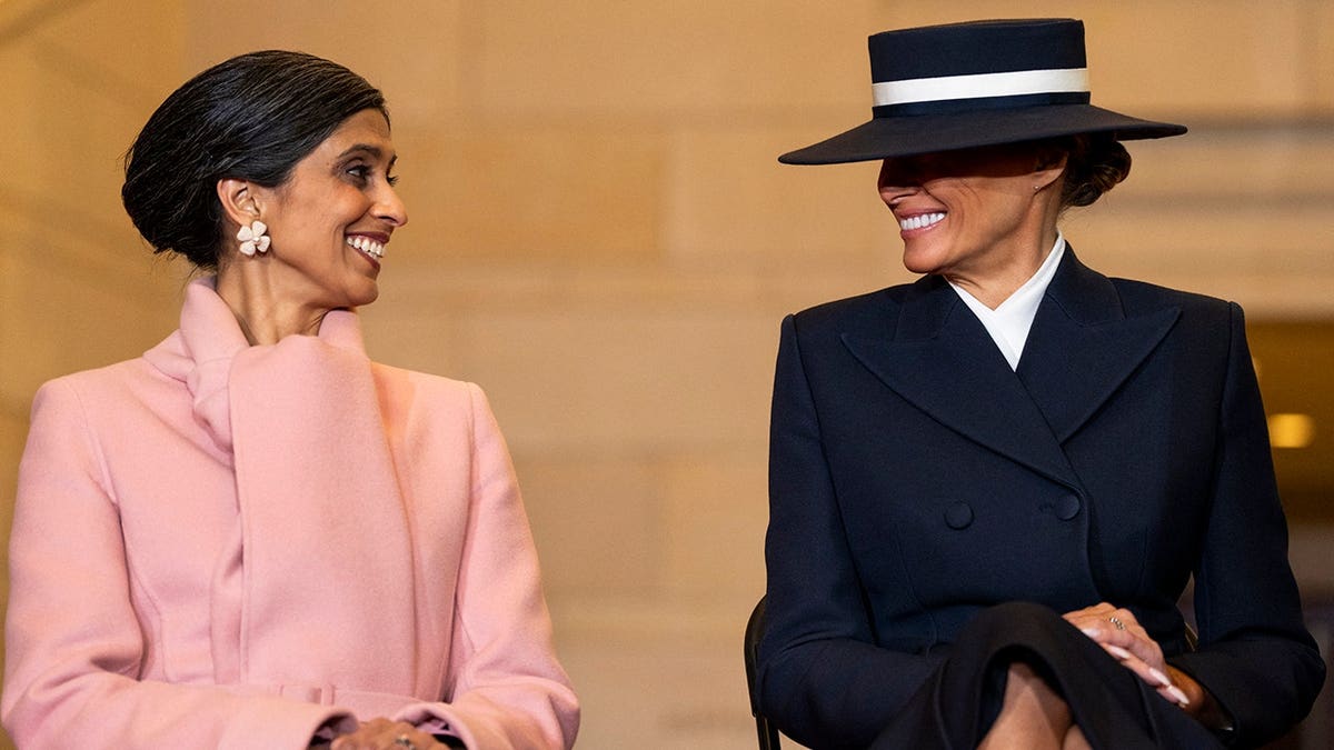 US Second Lady Usha Vance and First Lady Melania Trump smiling during inauguration ceremony