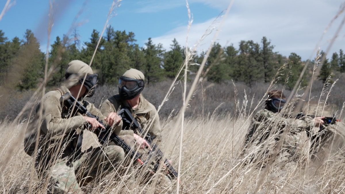 Cadets hold air soft guns on the lookout