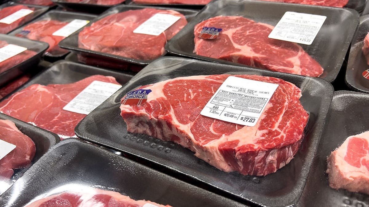 USDA Choice beef rib eye steaks displayed for sale at a supermarket