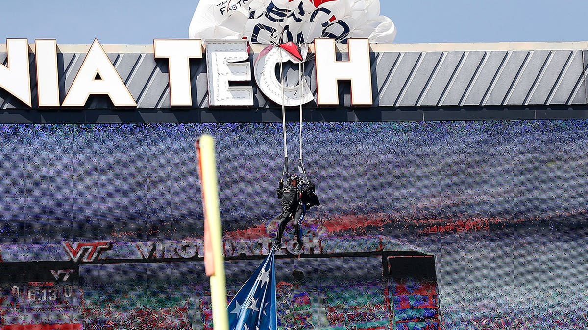 A paratrooper crashing into a jumbotron at Lane Stadium in Blacksburg, Va.