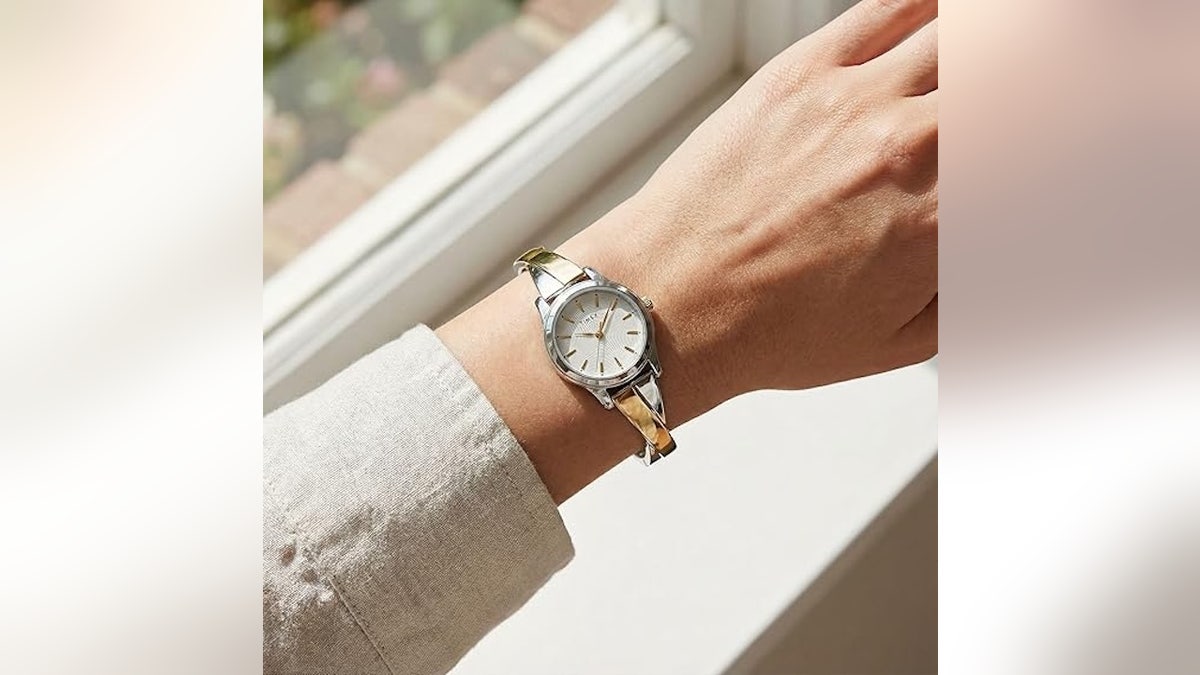 This fashionable Timex is water-resistant up to 100 feet.