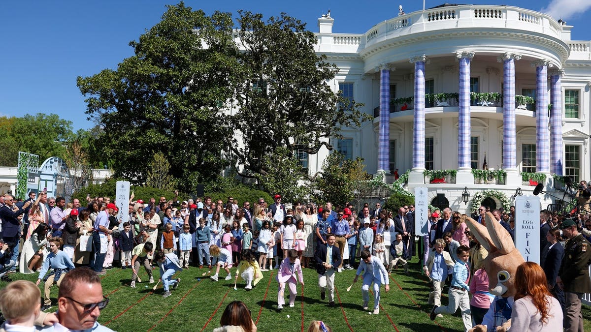 white house lawn egg roll kids playing