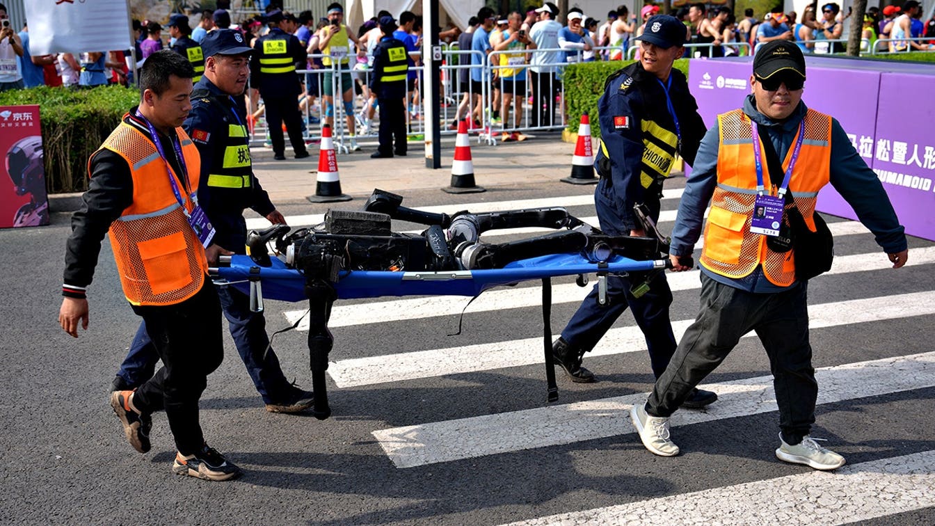 Chinese marathon robot falls, break dances itself to pieces