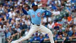 Chicago Cubs pitcher Edward Cabrera pitching during a baseball game at Wrigley Field