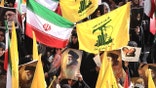 Hezbollah and Iranian flags