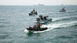 Naval units from Iran and Russia conducting a rescue simulation at the Port of Bandar Abbas