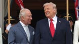 King Charles III and President Donald Trump talking on White House balcony