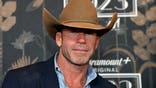 Taylor Sheridan standing at the 1923 Las Vegas premiere screening