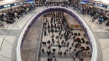 Travelers lining up at a TSA checkpoint inside George Bush Intercontinental Airport in Houston