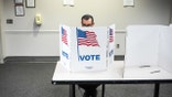 A person voting at Fairfax Government Center in Virginia.