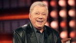 William Shatner standing on the set of The Kelly Clarkson Show.