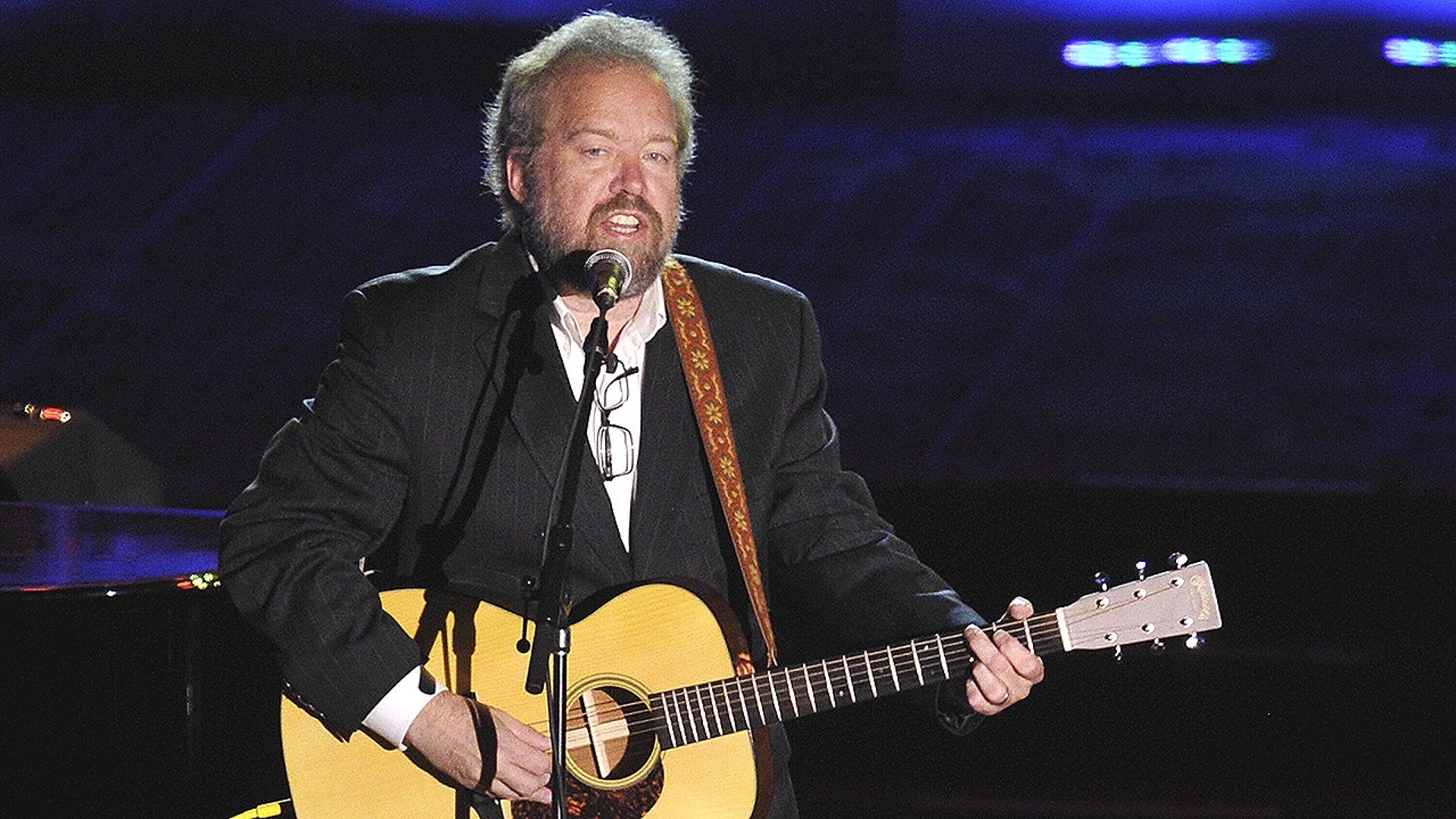 Don Schlitz performing with guitar at Songwriters Hall of Fame gala