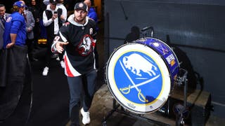 Josh Allen annihilates a beer to fire up the Sabres crowd