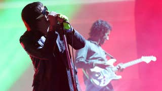 The Strokes end Coachella weekend two set with politically charged video targeting CIA and US government