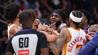 Two players ejected after scrum amid Knicks' 50-point lead vs. Hawks sends referee crashing to the court