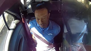 Tiger Woods utters sarcastic 3-word remark after getting placed in back of cop car during DUI arrest