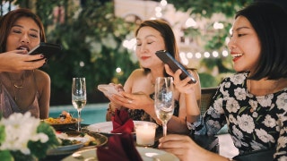 Restaurants lock up customers' phones as devices become the 'new cigarettes'