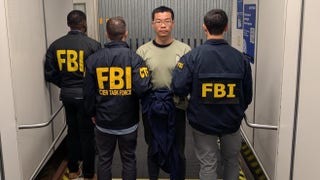 FBI brings alleged China-linked hacker to US in rare extradition as Patel defends Italy trip