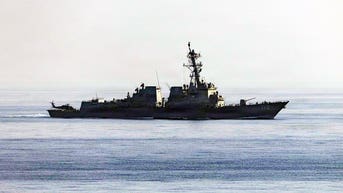2 ships looking to leave Iranian port are confronted by US warship: report - Fox News