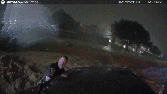 Heart-stopping video shows officers use unlikely tool to save family from flood - Fox News