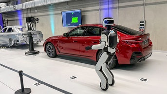 Major car manufacturer puts humanoid robots to work building EVs - Fox News