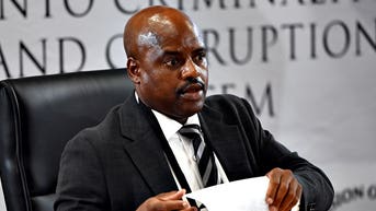 Justice halts hearing after sweaty ex-police chief gets tissue stuck on his forehead - Fox News