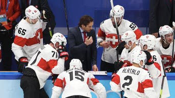 Swiss hockey coach bought bogus COVID vaccine card on social media for Beijing Games - Fox News