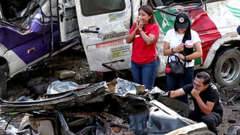 Death toll from Colombia bus bombing rises to 20 during wave of violence