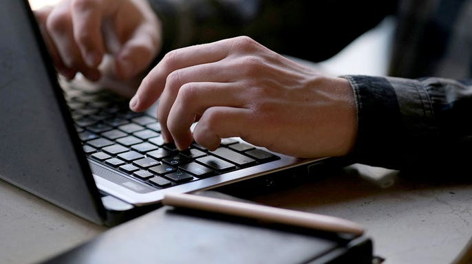 A man typing