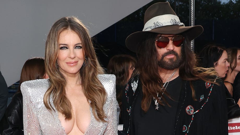 Billy Ray Cyrus gushes over 'beautiful girlfriend' Elizabeth Hurley after Olivier Awards red carpet