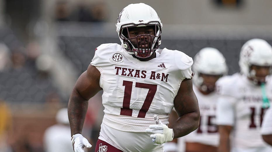 Albert Regis' baby daughter crawled toward a Jaguars cup before he was drafted by Jacksonville