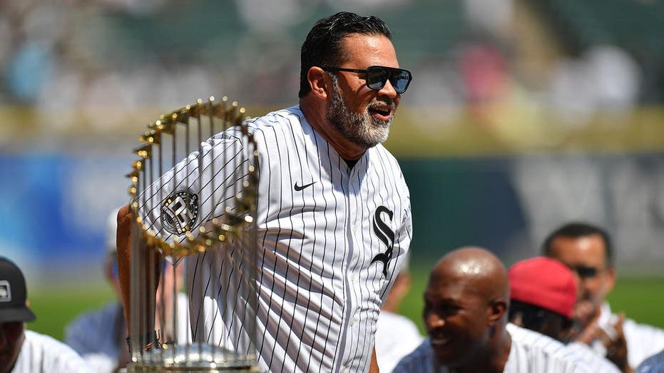 World Series-winning manager gets emotional after learning on live TV his team will retire his number