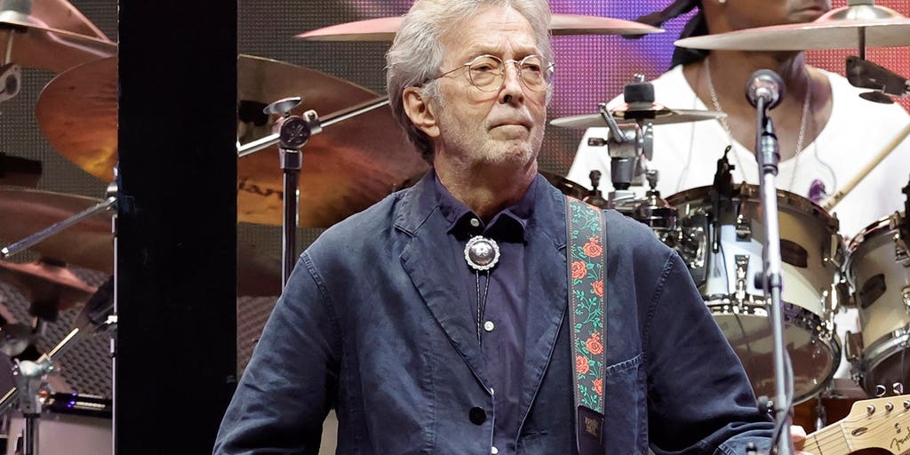 open lace back dress Eric Clapton Stratocaster