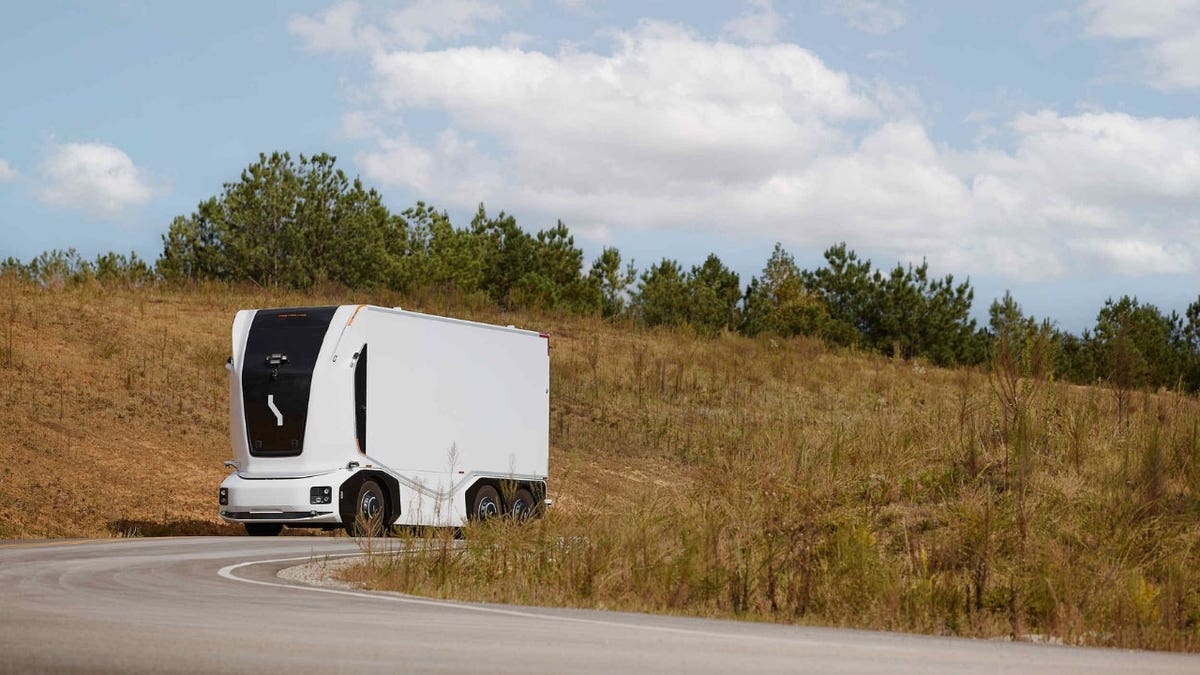 Driverless truck driving itself on a street.