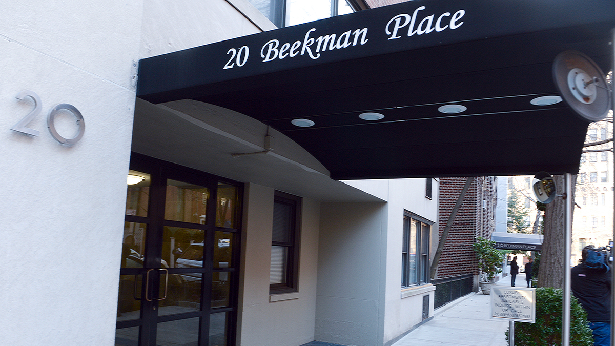 The entrance to 20 Beekman Place in Manhattan, where Thomas Gilbert Sr. was found fatally shot