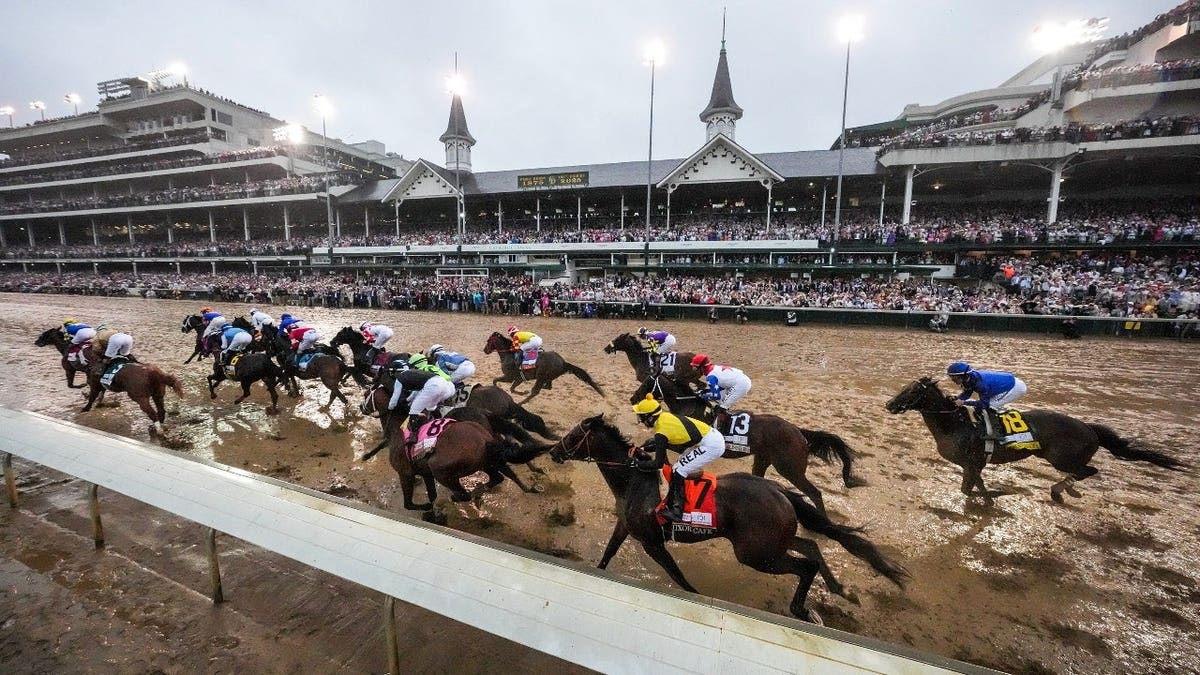 The field for the 151st running of the Kentucky Derby makes it past the grandstands for the first time on Saturday, May 3, 2025, at Churchill Downs in Louisville.