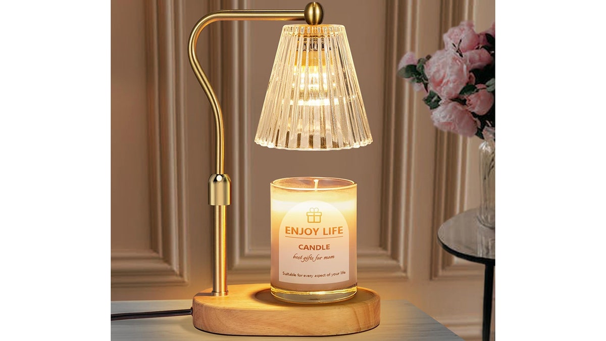 A candle-warming lamp fits in with the decor she already has.
