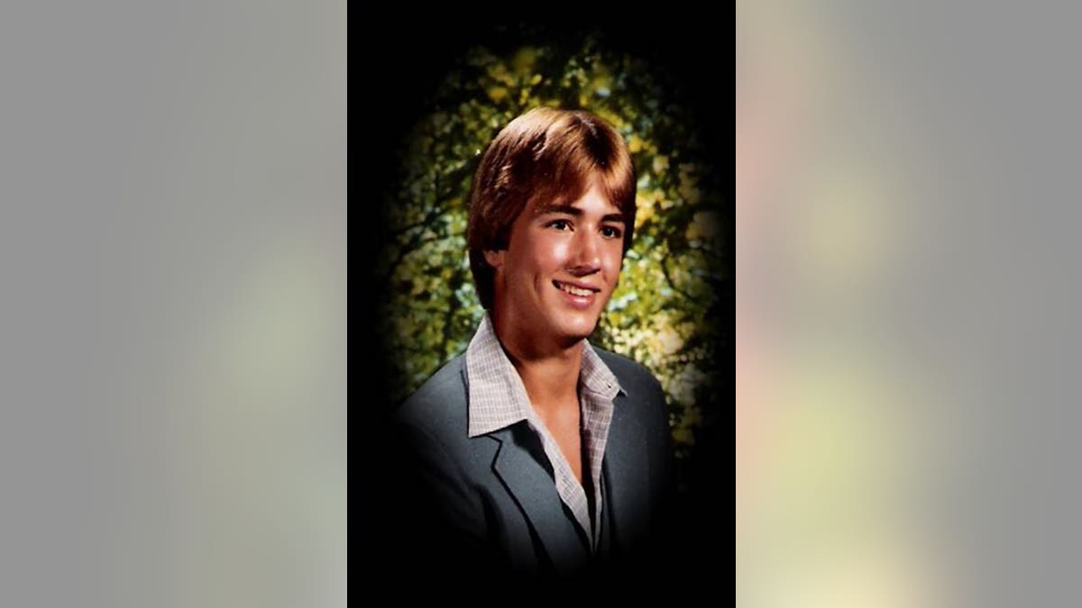 A high school portrait of Al Robinson.