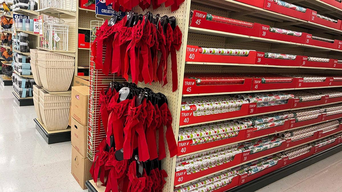 Hobby Lobby is selling Christmas bows and wrapping paper.