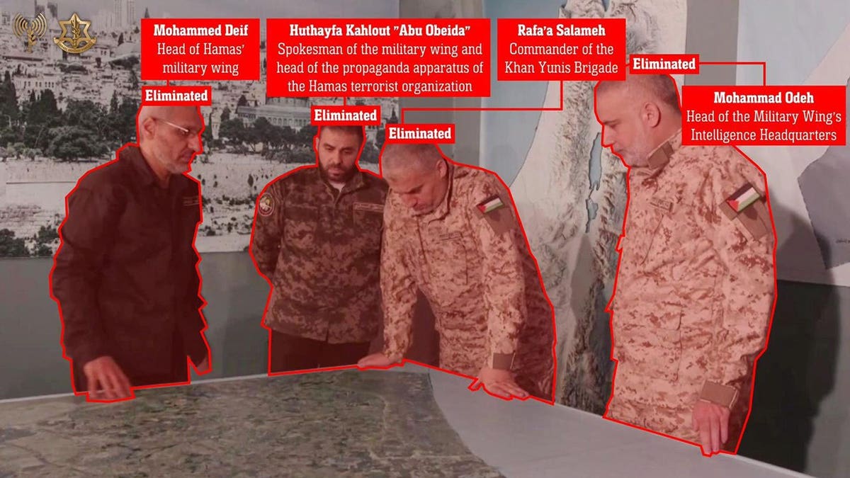 Mohammed Odeh and Hamas leaders stand around table