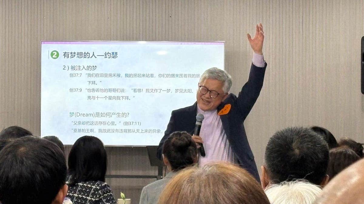 Ezra Jin leads a work  astatine  Zion Church successful  China