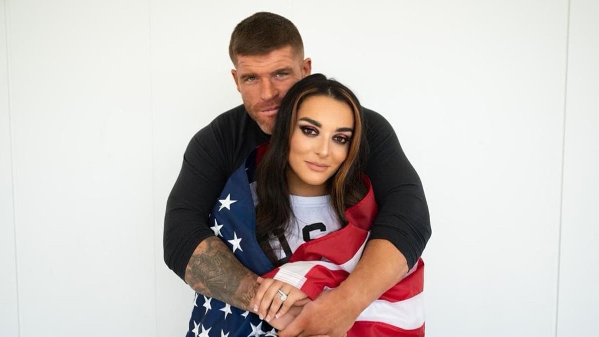 Steve Maclin hugs Deonna Purrazzo